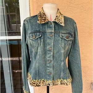 A trucker style Jean jacket with velvet animal print embellishments on jacket